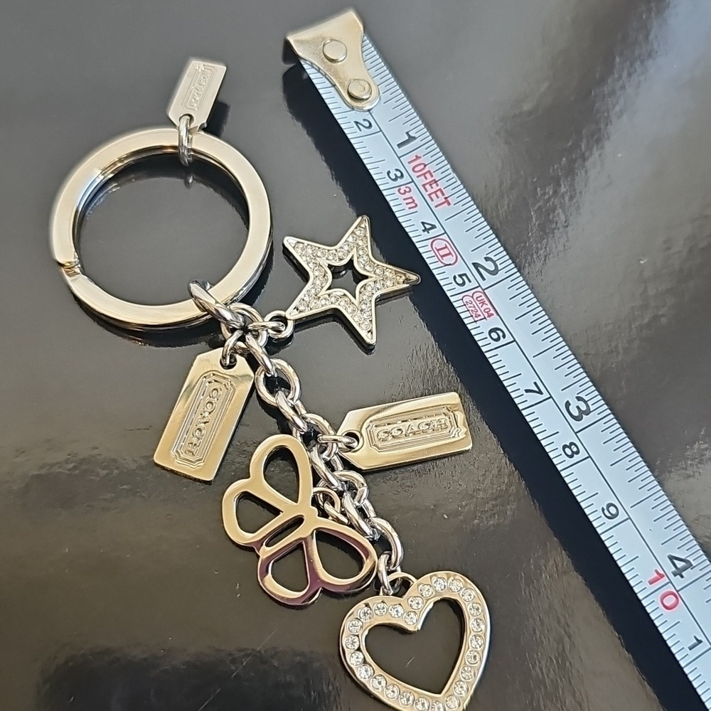 Coach NWOT Silver Keychain with Heart, Star, and Butterfly Charms - Picture 6 of 7